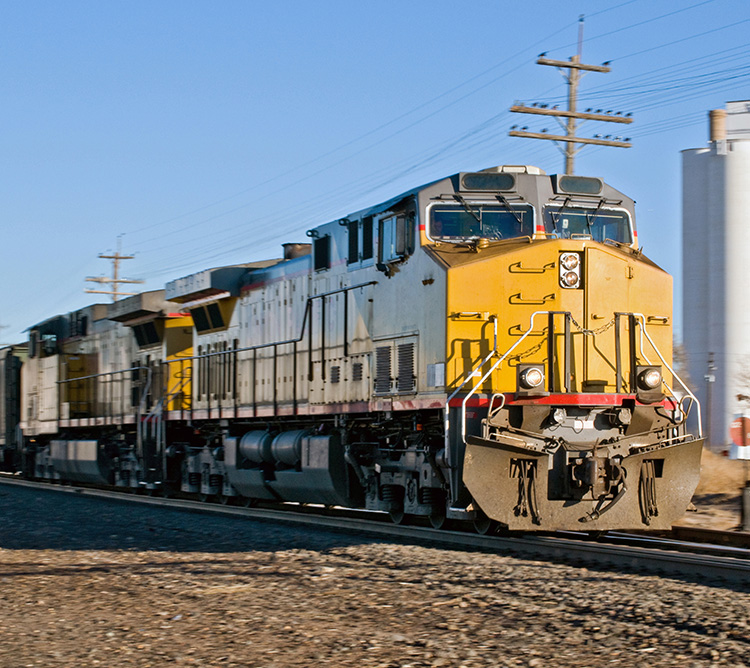 Freight train going through a rural Colorado town